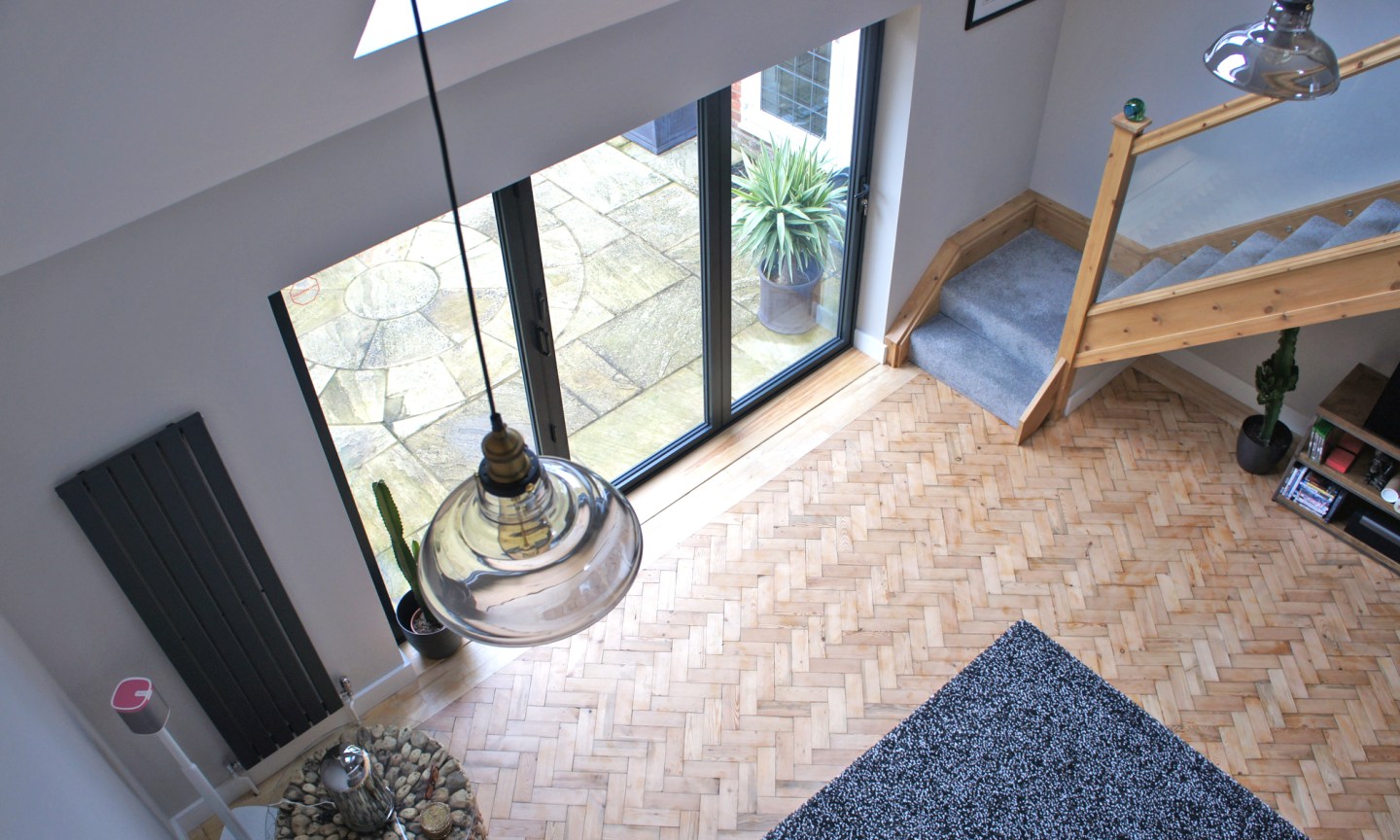A staircase and parquet flooring in a property extension